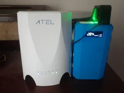 ATEL WB550 next to optional blue portable power pack