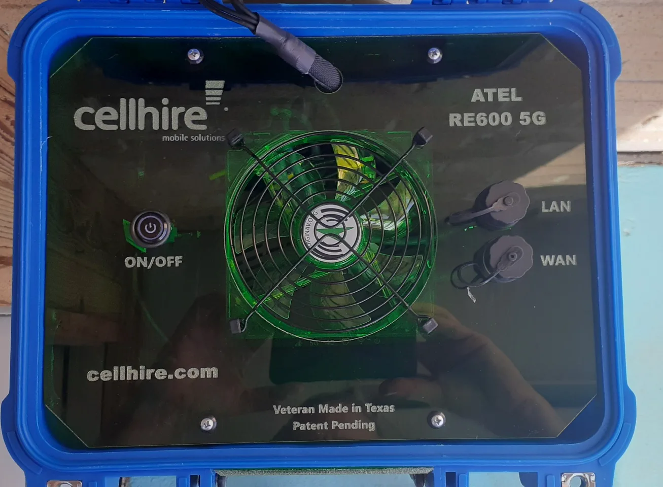 custom-branded case opened to show ATEL RE600 5G interface panel